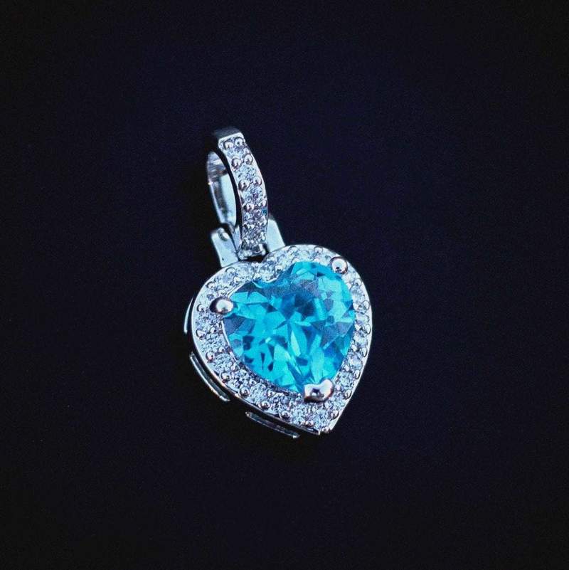 Iced Heart Cz Pendant In White Gold Blue Stone